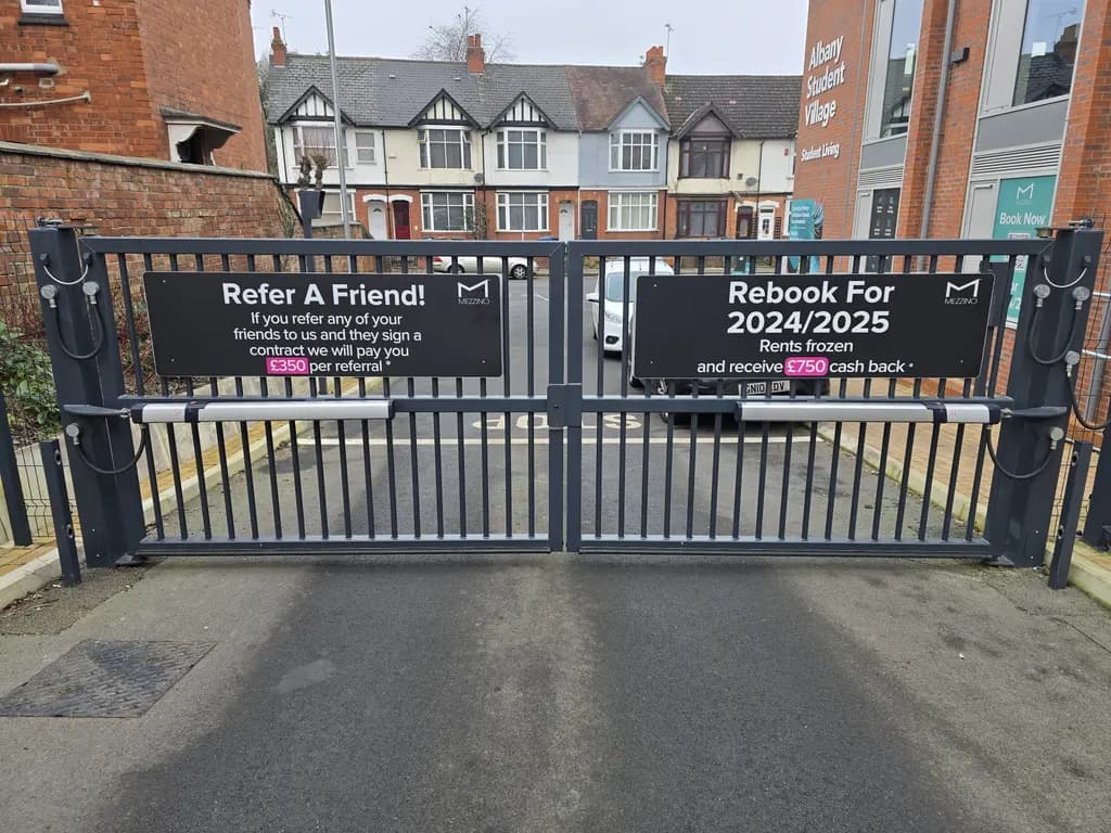 Bar gates controlling parking access at a managed residential development