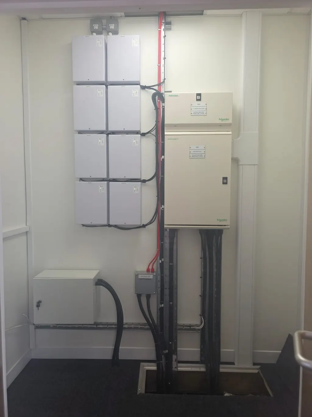Gate control panel and electrical enclosures inside a housing, wired and labelled
