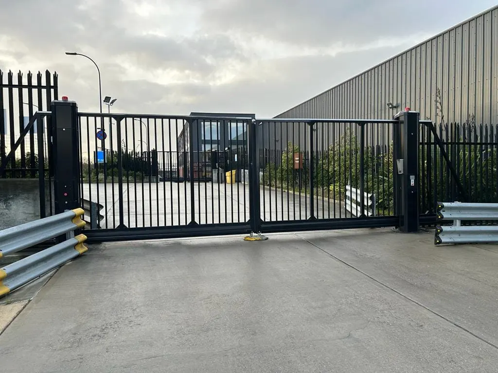 Palisade double gates securing the yard of an industrial unit